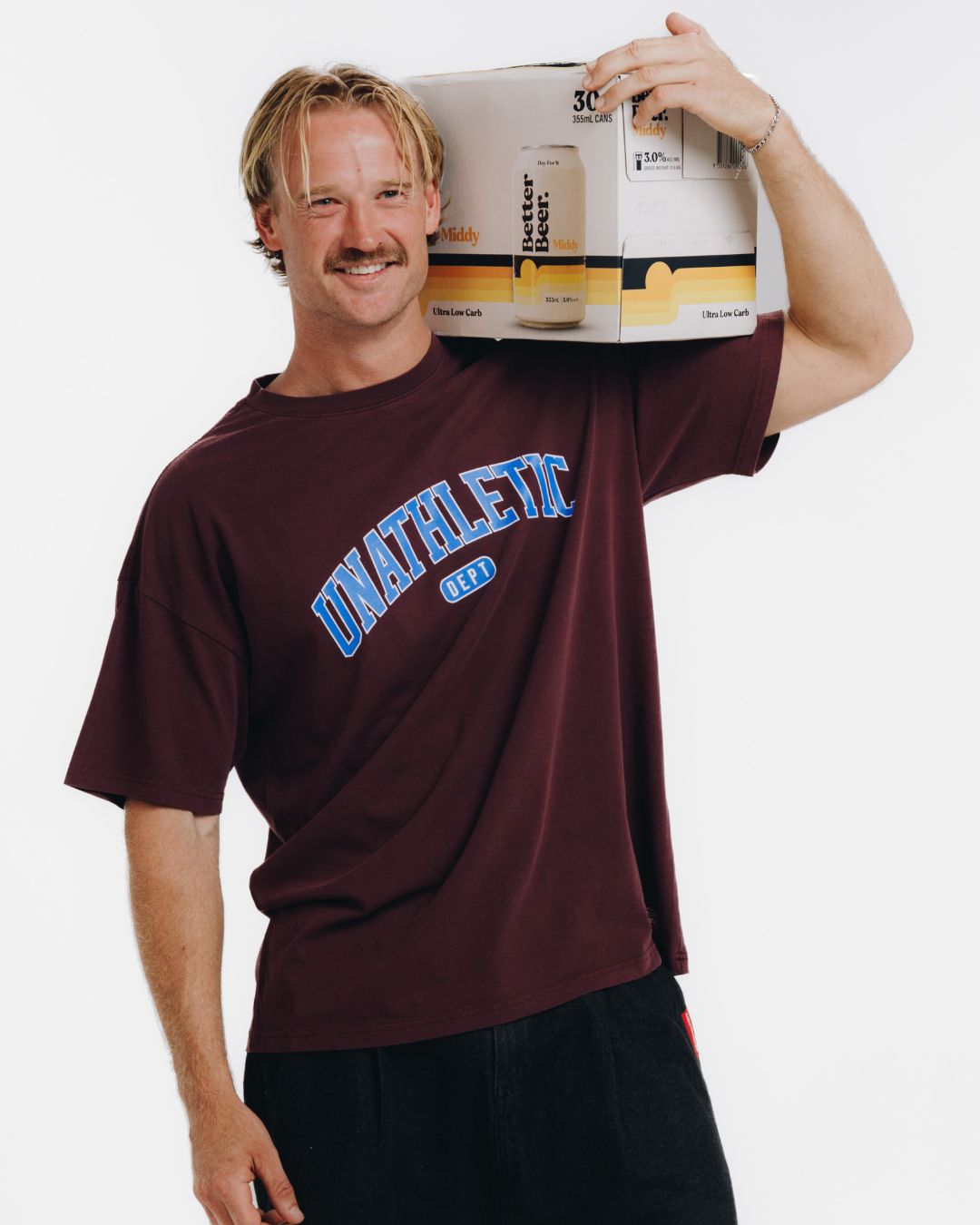 Unathletic Tee Maroon features Middy in 30 pack cans | Better Beer